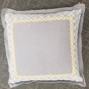 Grey Pillow with Patterned Boarder