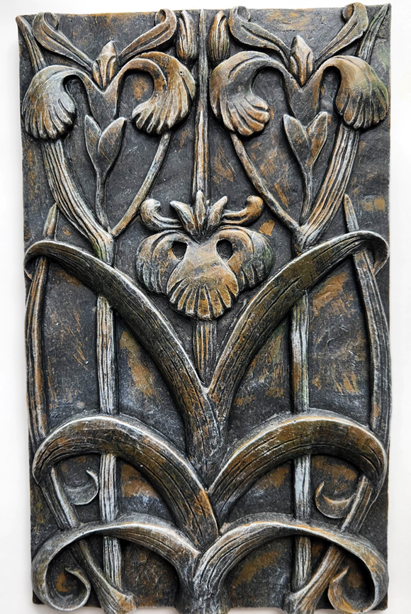 Cast concrete Iris plaque